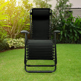 Folding recliner chair with a headrest. There are different color options. This image shows a black frame chair with black sling fabric. It's sitting on grass in a sunny backyard. This is the view from the front.