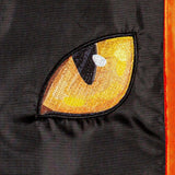 Outdoor Halloween flag. Features an orange border and a shiny, black background. It also features two bright, yellow-orange eyes and a message that reads "HAPPY HALLOWEEN."