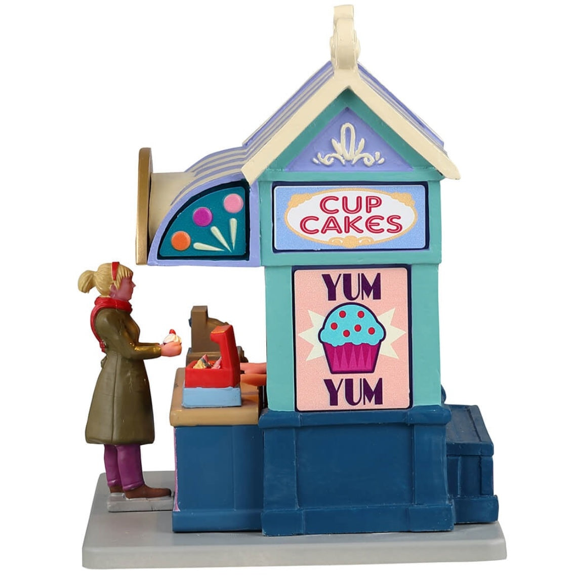 Resin village accent for a Lemax display. Designed to look like a cupcake vendor booth. It's run by Rosette and it's sweets to go. The colors of the booth are light purple, tan, pink, light blue and dark blue.