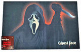 Rug for Halloween. There are two options. One is black with Ghost Face holding a knife. The other option is red and orange and reads "Halloween: A Rob Zombie Film." It has Michael Myers holding a knife in front of a home.