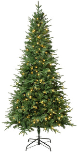 Artificial tree pre-lit with warm white lights.