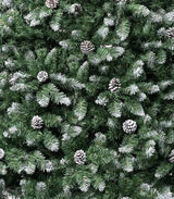 Artificial tree with pine cones and white on the branch tips to look like snow.