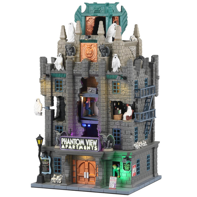 Resin lighted building for a Lemax display. Designed to look like a tall stone apartment building. There are ghosts everywhere and skulls. Parts of the building are missing so you can see ghosts inside their homes.