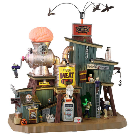 Resin building for a Lemax display. Designed to look like a really weird meat packing plant. There are crows flying above. There's a large statue of a brain going into a meat grinder on the roof. There are monsters working.