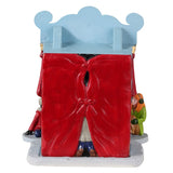 Resin village accent for a Lemax display. Designed to look like a booth decorated to look like a mini theatre with a red curtain. There are two puppets inside and four kids watching.