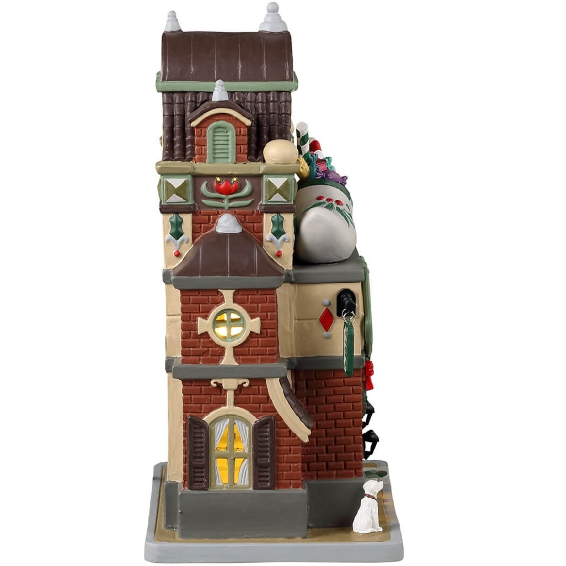 Porcelain lighted building for a Lemax display. Designed to look like a brick shoe store. There's a large wooden shoe statue with gifts inside on the roof. Santa is near the front, offering to help you find the perfect shoes. There's also a white dog on the sidewalk.