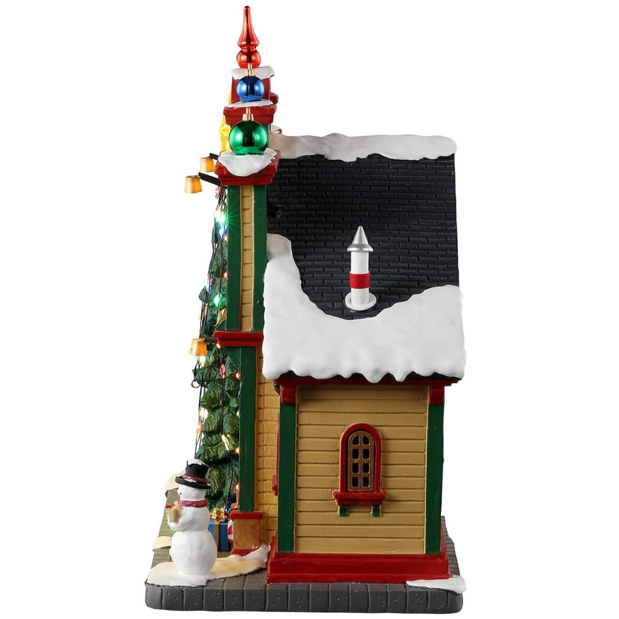Resin lighted building for a Lemax display. Designed to look like a Christmas store. There are decorative ornaments on the roof, a large decorated Christmas tree over the front door, a nutcracker, presents and a snowman on the sidewalk.