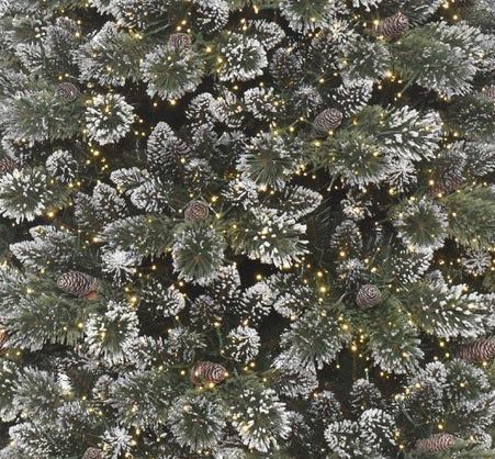 Artificial Christmas tree with white glitter on the branches to look like snow. Pre-lit with dual LED lights. Lights change from warm white to multi-colored.