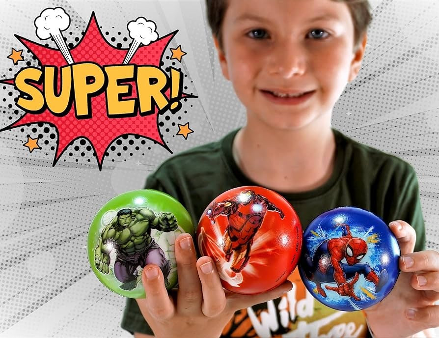 This image shows a boy holding three of the squeeze balls, to show how small they are.