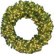 This image shows the 60 inch wreath pre-lit with Warm White twinkling LED lights. The wreath is up against a white background.