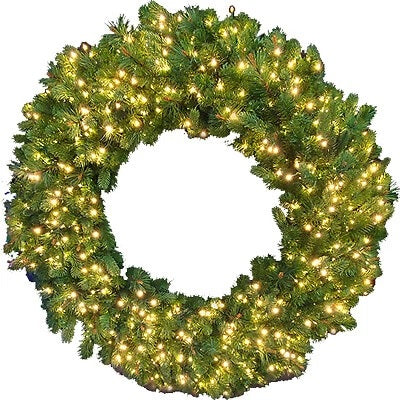 This image shows the 60 inch wreath pre-lit with Warm White twinkling LED lights. The wreath is up against a white background.