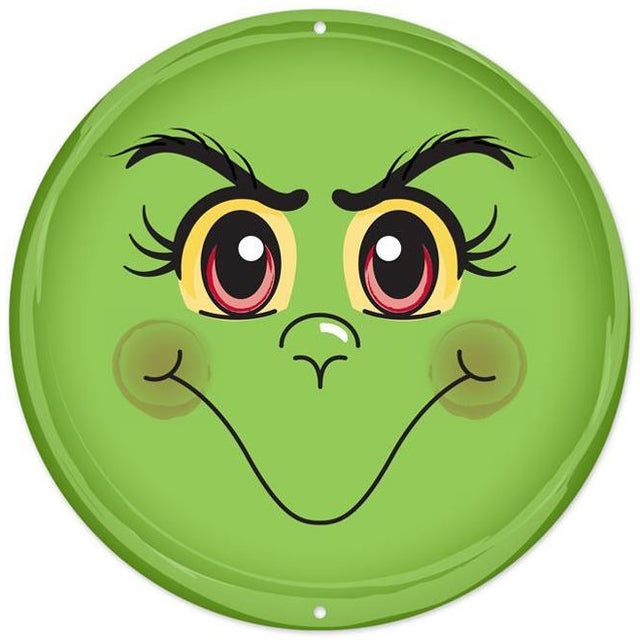 Round decoration designed to look like Grinch's green face.