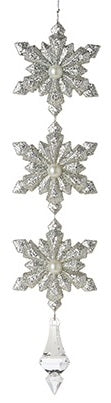 Snowflake drop ornaments. One is gold and the other is silver.