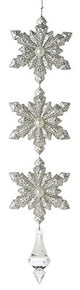 Snowflake drop ornaments. One is gold and the other is silver.