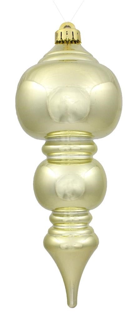 Shiny gold ornament shaped like a mixture of ball and finial ornament.