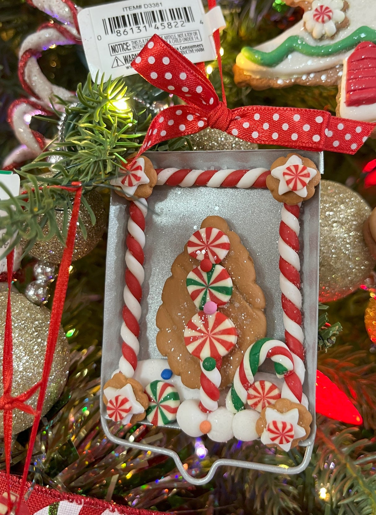 Ornaments designed to look like cookies in silver cut outs or on trays.