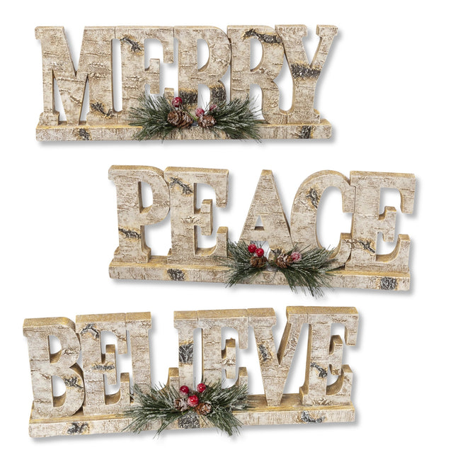 Tabletop decorations that look like they were carved out of birch wood. This picture shows all three options available.