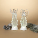Lighted angel decoration with swirling glitter inside.
