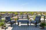 This is a lifestyle image showing this patio furniture set on a balcony overlooking a Midwestern neighborhood on a sunny day.