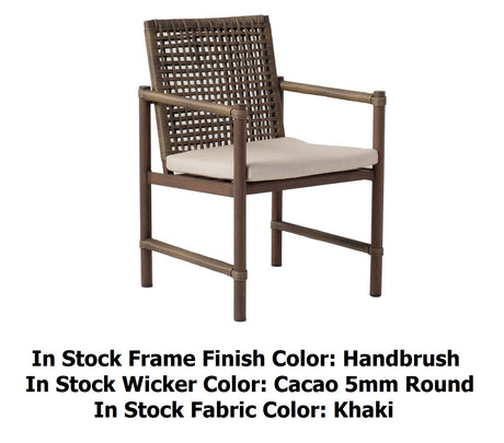 This image shows what the dining chair looks like on a white background. The photo reads "In stock frame finish color: Handbrush. In stock wicker color: Cacao 5mm Round. In stock fabric color: Khaki."
