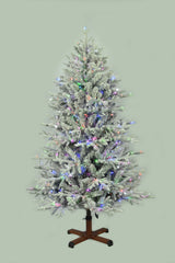 This image shows the flocked Christmas tree pre-lit with Multi-Colored Starry Lights. The tree is up against a light gray background.