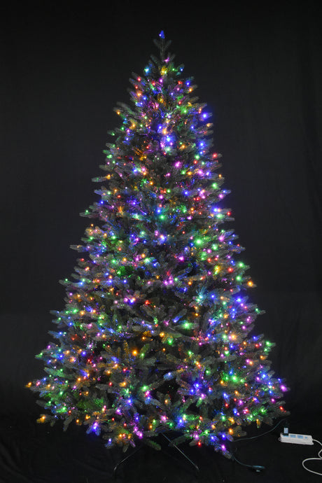 Artificial tree pre-lit with multi-colored starry LED lights.