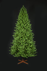 This image shows the tree with the lights turned off. It has a wooden stand. This tree is shown against a black background.