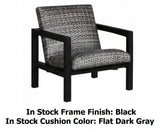 This image shows what the club chair looks like on a white background. The image reads "In Stock Frame Finish: Black. In Stock Cushion Color: Flat Dark Gray."