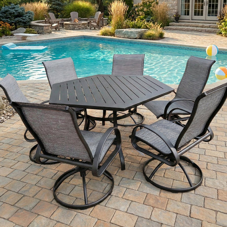 This is a lifestyle image showing this patio dining set on a brick patio next to an in-ground pool.