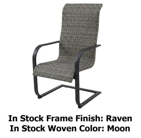 This image shows the wicker spring dining chair on a white background. The image reads "In Stock Frame Finish: Raven. In Stock Woven Color: Moon."