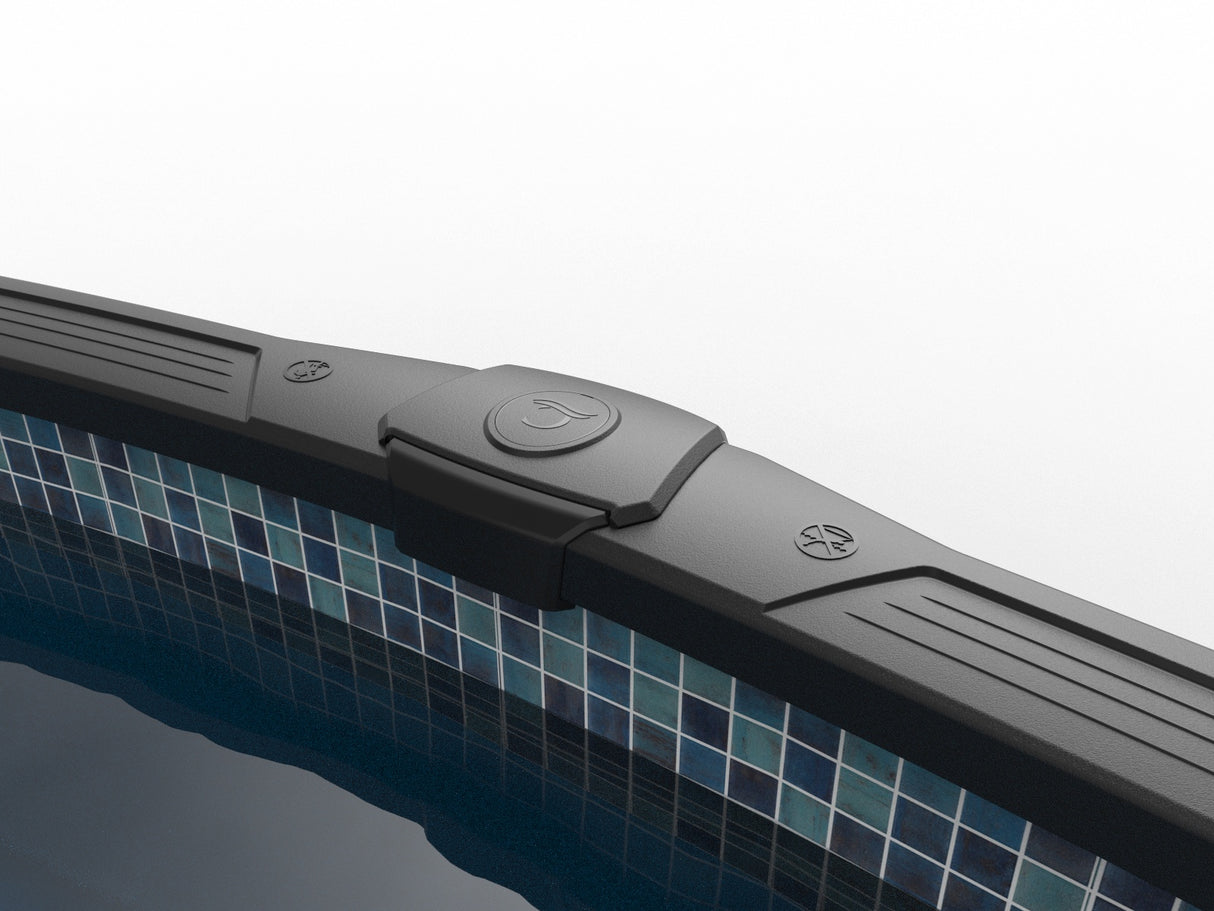 This image is focusing on the top rail and the top of the wall from inside the pool.