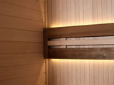 This image shows the lighting on the wall inside the sauna.