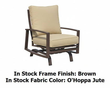 This image shows the swivel glider chair on a white background. The image reads "In Stock Frame Finish: Brown. In Stock Fabric Color: O'Hoppa Jute."