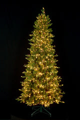 This image shows this specific tree with the Warm White Starry LED lights on on a black background.