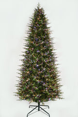This 11 ft. artificial Christmas tree is pre-lit with Multi-Colored Starry Lights. This tree is up against a white background.