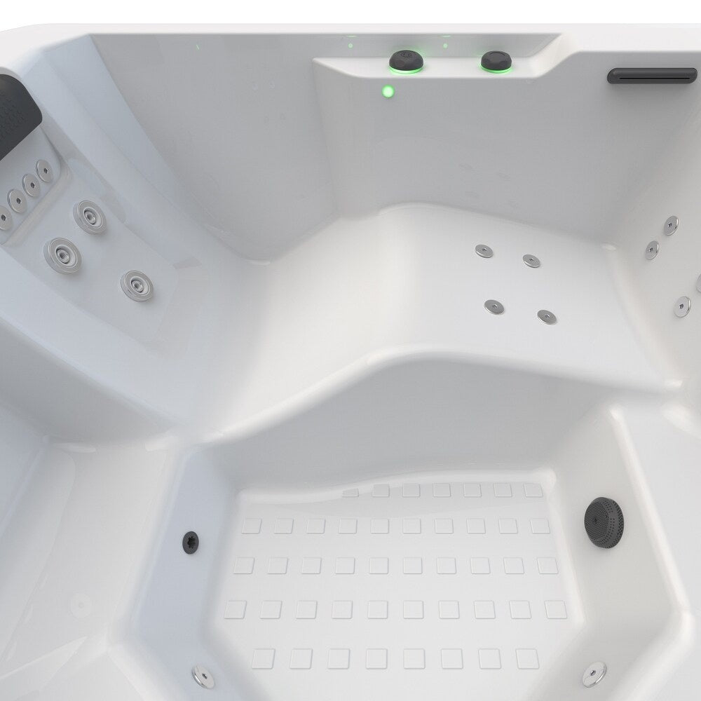 This image shows the inside of the hot tub, specifically the lounger seat.