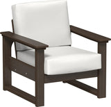This image shows the deep seating chair on a white background. The frames are Brazilian walnut and the cushion is canvas.
