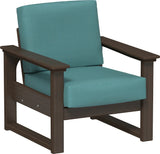This image shows the deep seating chair on a white background. The frames are Brazilian walnut and the cushion is cast breeze.