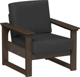 This image shows the deep seating chair on a white background. The frames are Brazilian walnut and the cushion is spectrum carbon.