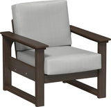 This image shows the deep seating chair on a white background. The frames are Brazilian walnut and the cushion is spectrum dove.