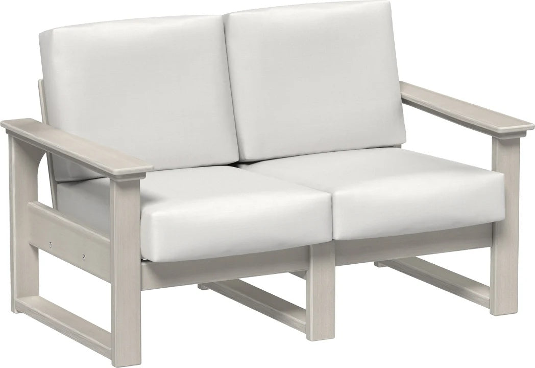 This image shows the deep seating loveseat on a white background. The frames are birch and the cushions are cavnas.