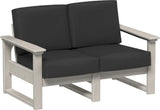 This image shows the deep seating loveseat on a white background. The frames are birch and the cushions are spectrum carbon.