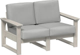 This image shows the deep seating loveseat on a white background. The frames are birch and the cushions are spectrum dove.