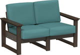 This image shows the deep seating loveseat on a white background. The frames are Brazilian walnut and the cushions are cast breeze.