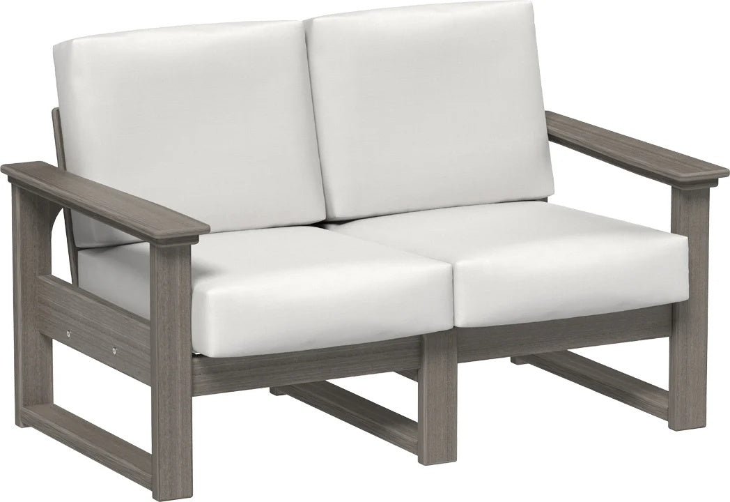 This image shows the deep seating loveseat on a white background. The frames are coastal gray and the cushions are canvas.