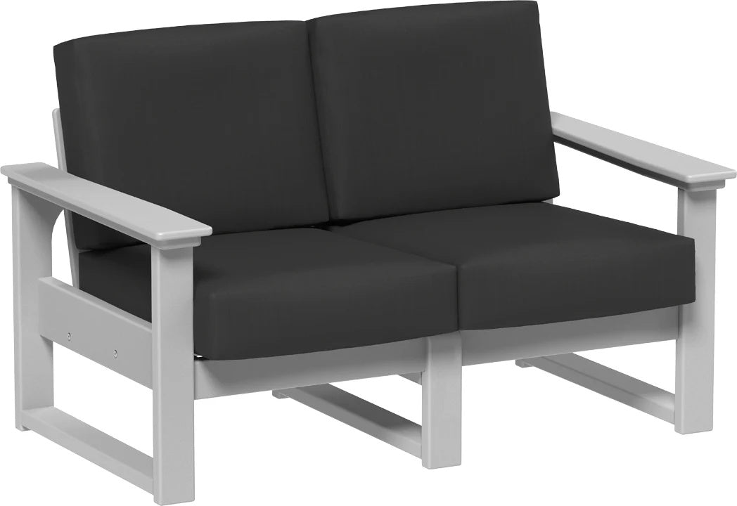 This image shows the deep seating loveseat on a white background. The frames are dove gray and the cushions are spectrum carbon.
