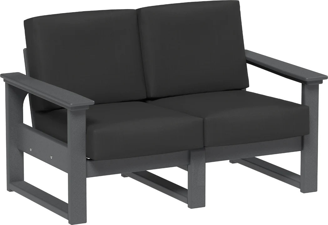 This image shows the deep seating loveseat on a white background. The frames are slate and the cushions are spectrum carbon.