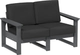 This image shows the deep seating loveseat on a white background. The frames are slate and the cushions are spectrum carbon.