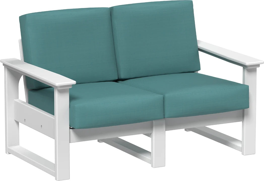 This image shows the deep seating loveseat on a white background. The frames are white and the cushions are cast breeze.