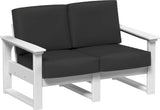 This image shows the deep seating loveseat on a white background. The frames are white and the cushions are spectrum carbon.